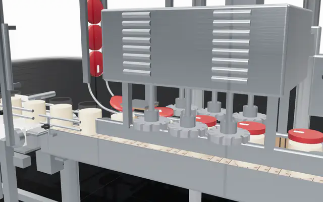 Lids spinning onto canisters on the line