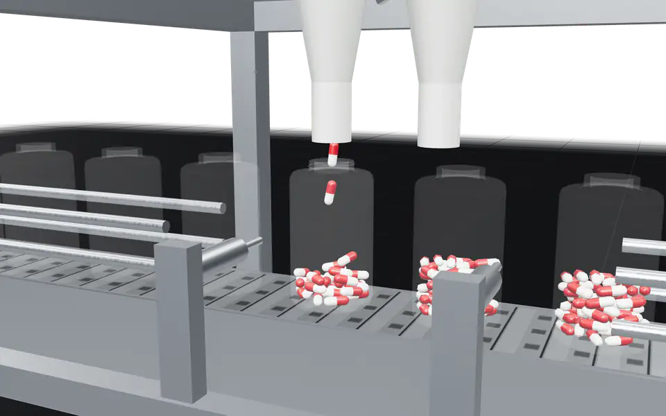 Capsules pouring into a bottle